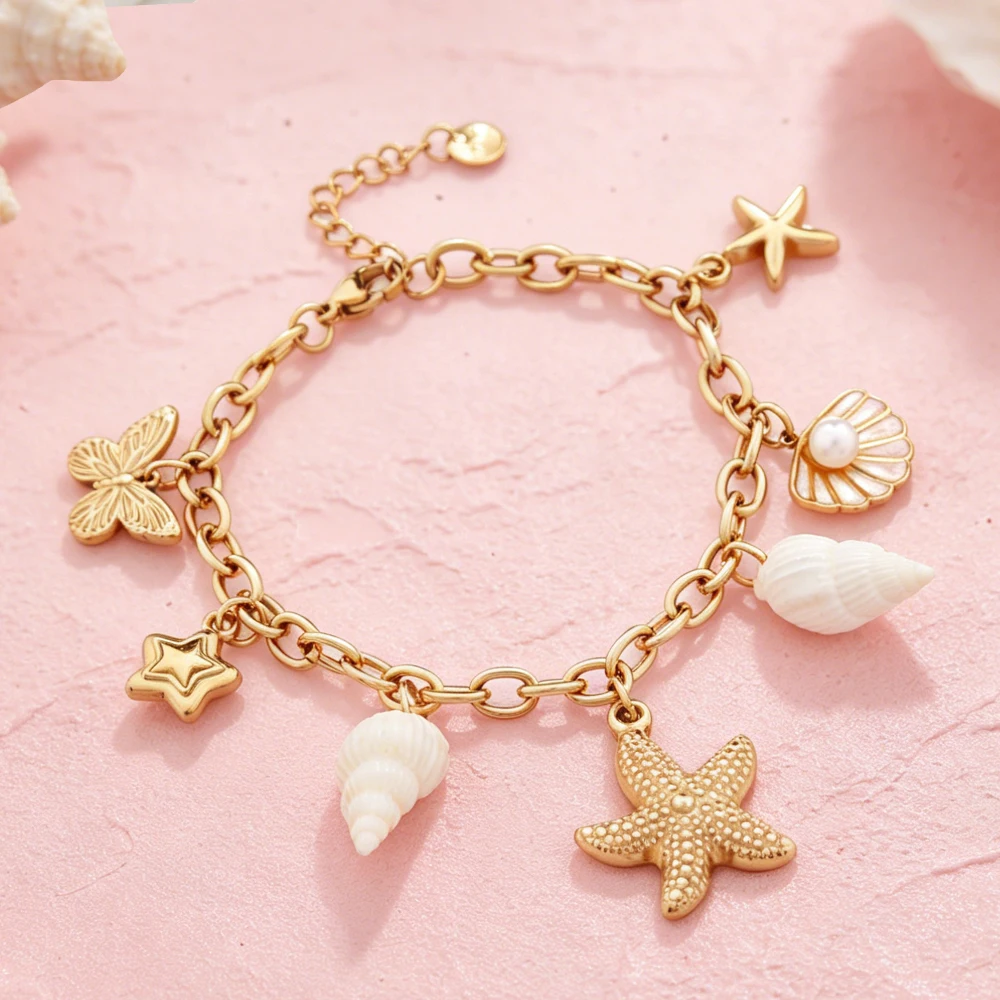 Boho Nautical Style Stainless Steel Charm Bracelet Gold Plated Starfish Conch Butterfly Inlaid Pearl Jewelry for Beach Party
Boho Nautical Style Stainless Steel Charm Bracelet Gold Plated Starfish Conch Butterfly Inlaid Pearl Jewelry for Beach Party