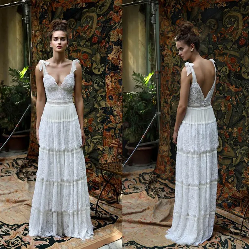 Lihi Hod Lace Bridal Gowns Spaghetti Neckline Tiered Backless Wedding Dresses Custom Made Floor Length Robe De Marie
Lihi Hod Lace Bridal Gowns Spaghetti Neckline Tiered Backless Wedding Dresses Custom Made Floor Length Robe De Marie