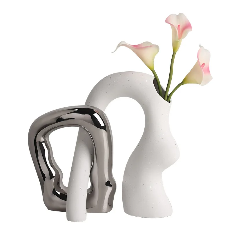 Creative ceramic special-shaped vase high-end home living room flower arrangement TV cabinet wine cabinet decoration ornament 
Creative ceramic special-shaped vase high-end home living room flower arrangement TV cabinet wine cabinet decoration ornament