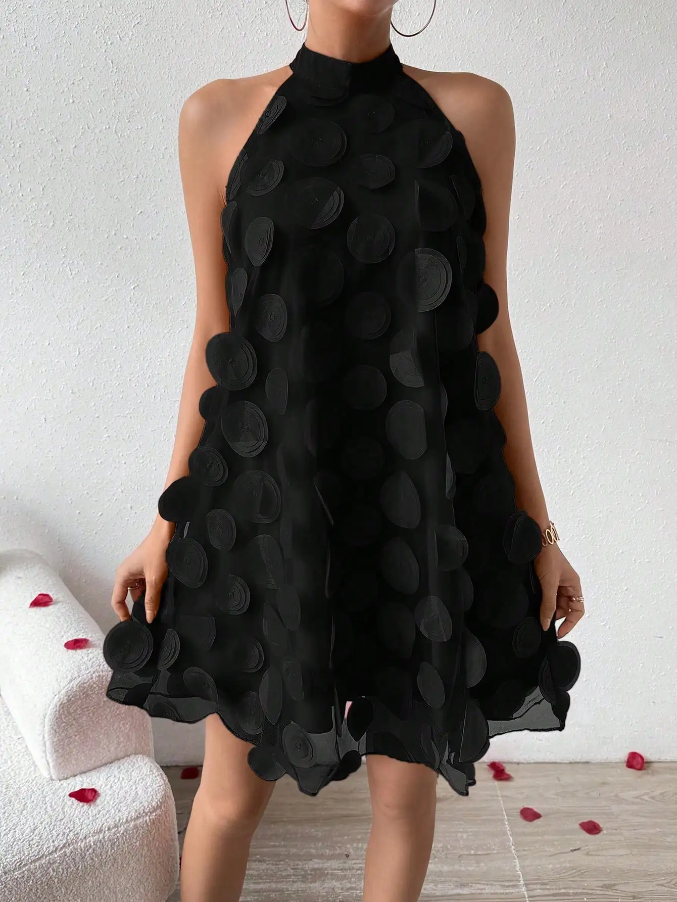 Black Halter Neck Sleeveless Dress with 3D Circular Appliqué Design
Black Halter Neck Sleeveless Dress with 3D Circular Appliqué Design