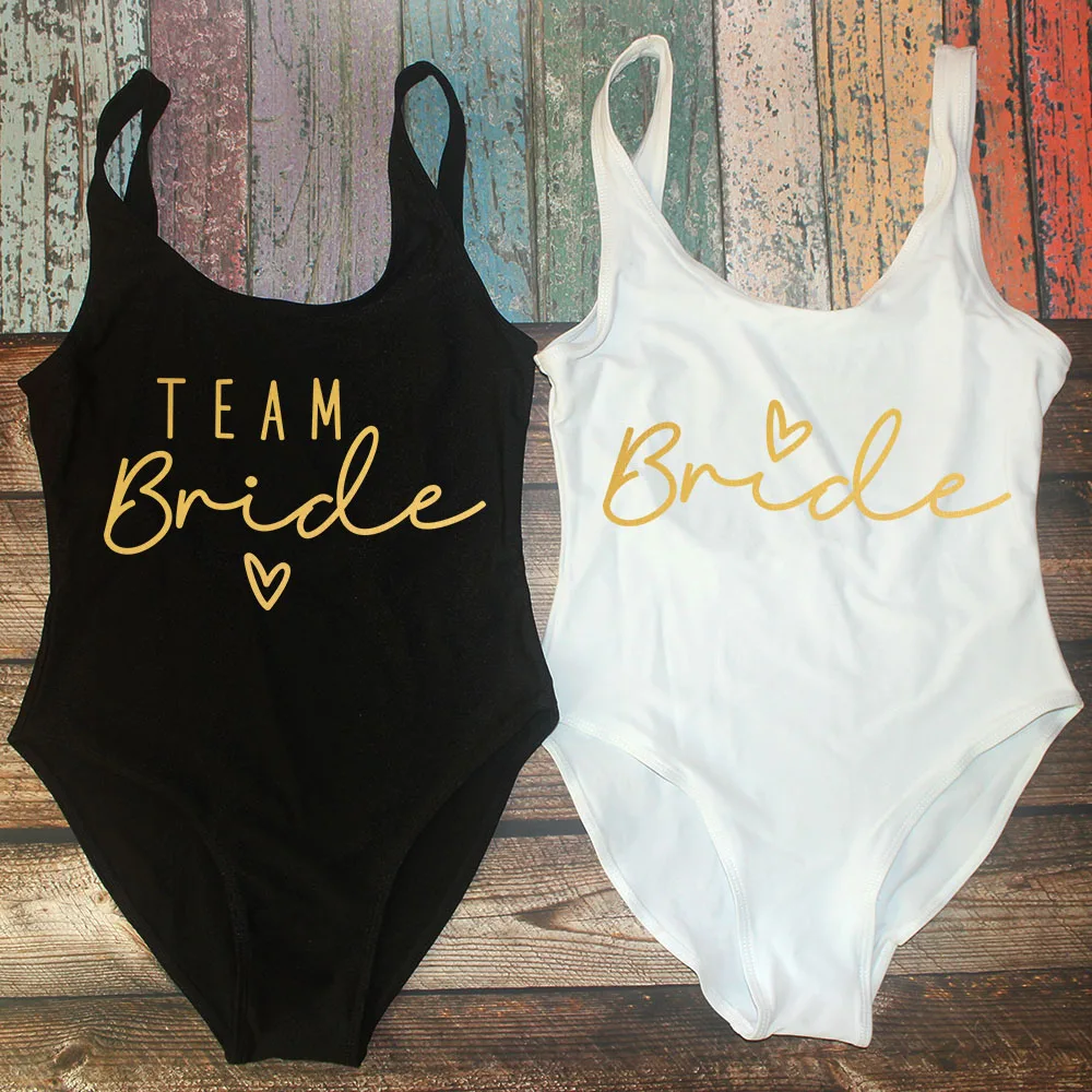S-3XL цельный купальник Team Bride с золотым принтом, женский купальник, купальник для девичника, летний купальный костюм
S-3XL цельный купальник Team Bride с золотым принтом, женский купальник, купальник для девичника, летний купальный костюм