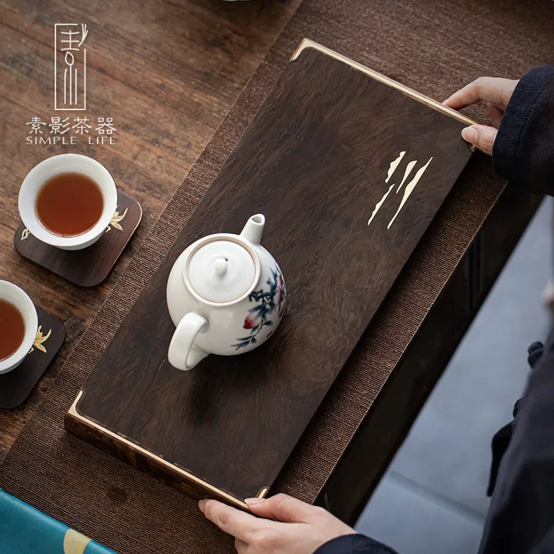 Simple whole solid wood tea tray ebony small tea table household dry foam tray simple tray Japanese practical pot bearing
Simple whole solid wood tea tray ebony small tea table household dry foam tray simple tray Japanese practical pot bearing