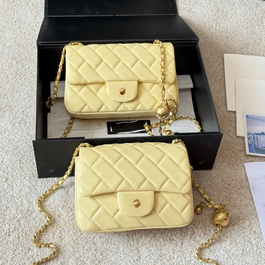 Designer Shoulder Bag Yellow Genuine Leather Bags Gold Ball Lady Purse Luxury Brand Handbag Black Brown Color Purse sac
Designer Shoulder Bag Yellow Genuine Leather Bags Gold Ball Lady Purse Luxury Brand Handbag Black Brown Color Purse sac