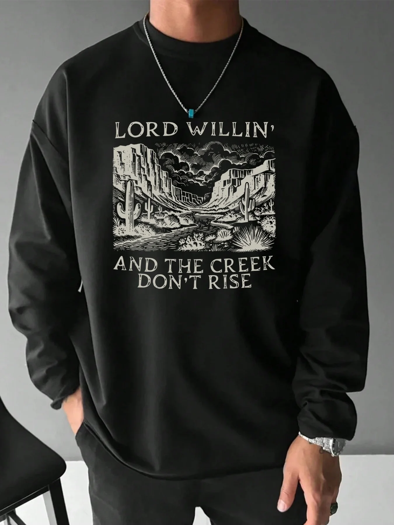 Men's black round-neck long-sleeved cotton T-shirt, featuring simple and creative western style
Men's black round-neck long-sleeved cotton T-shirt, featuring simple and creative western style