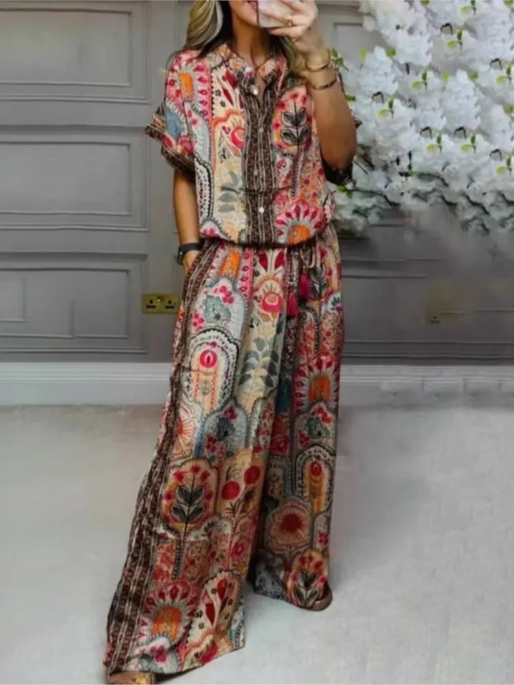 Женский летний костюм из двух предметов: модный повседневный комплект с принтом, свободный топ с короткими рукавами + широкие брюки.
Женский летний костюм из двух предметов: модный повседневный комплект с принтом, свободный топ с короткими рукавами + широкие брюки.