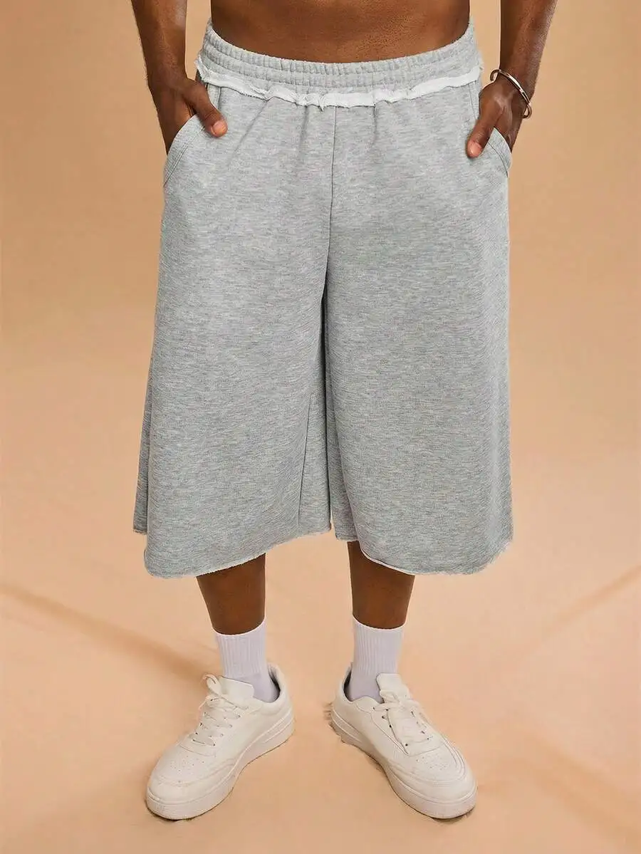 Grey Mens Loose Mid-Length Casual Shorts With Raw Hem, Streetwear Jogger Style, Baggy Oversized Fit For Daily Wear
Grey Mens Loose Mid-Length Casual Shorts With Raw Hem, Streetwear Jogger Style, Baggy Oversized Fit For Daily Wear
