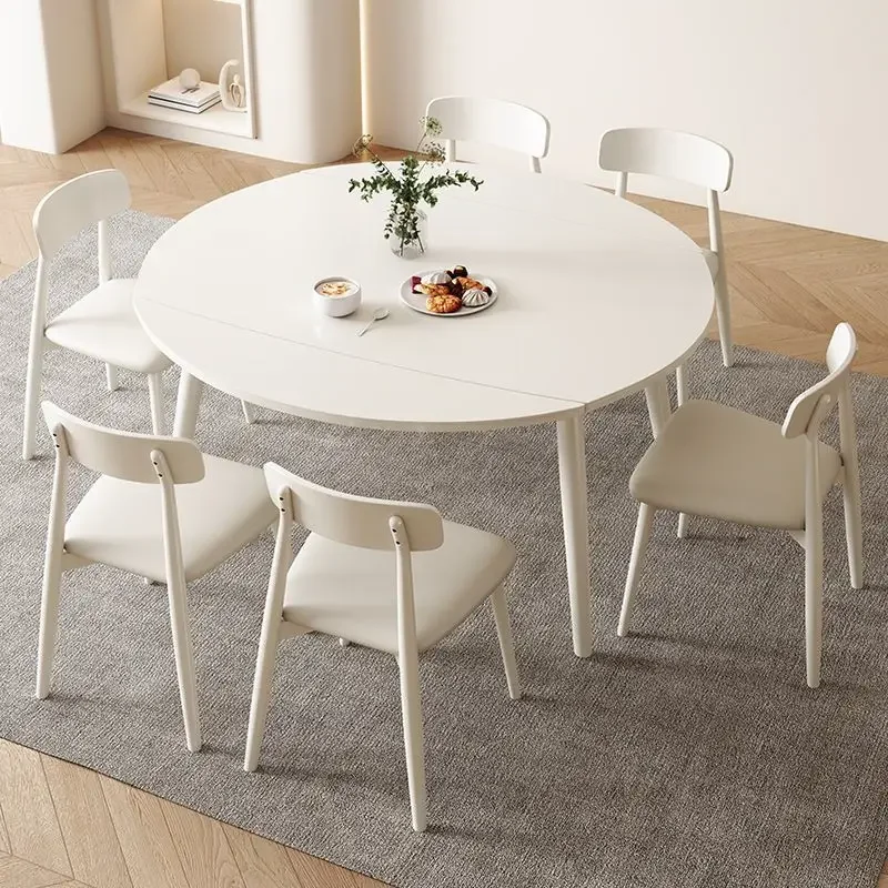 solid wood wind rock slab dining table, household extendable, miniaturized apartment, light luxury
solid wood wind rock slab dining table, household extendable, miniaturized apartment, light luxury
