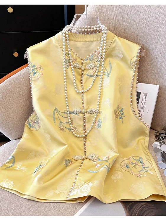 2026 new chinese retro national style women tang suit vest cheongsam buttons printed sequins sleeveless loose elegant vest top
2026 new chinese retro national style women tang suit vest cheongsam buttons printed sequins sleeveless loose elegant vest top