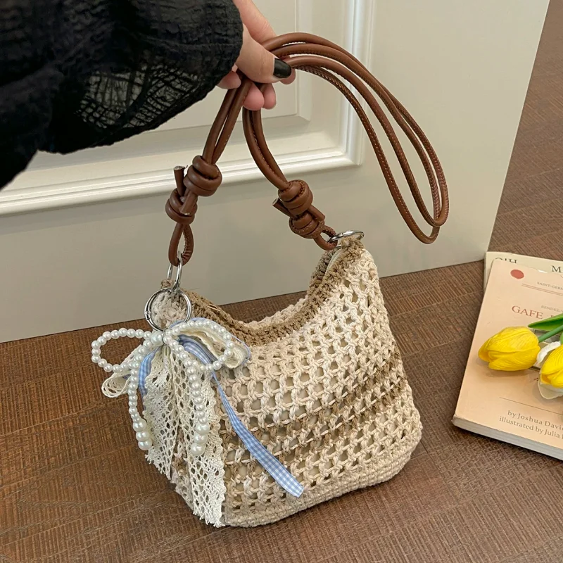 Hand-woven Straw Crossbody Bag With Pearl Lace Bow Summer Beach Hollow Out Shoulder Tote Women Boho Style Crochet Bucket Bag
Hand-woven Straw Crossbody Bag With Pearl Lace Bow Summer Beach Hollow Out Shoulder Tote Women Boho Style Crochet Bucket Bag