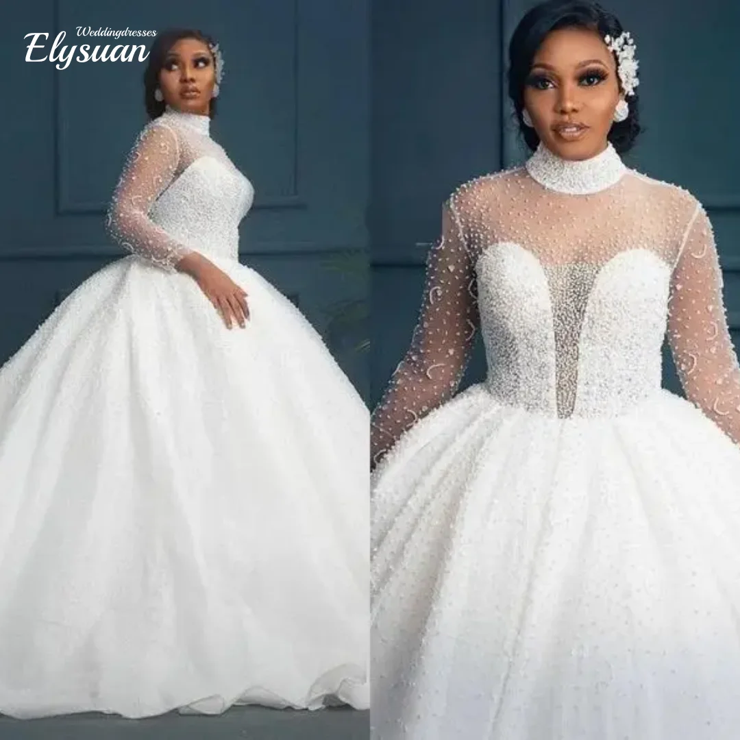 Customized New Appliqued Halter Pearls Beaded Bridal Dresses White Cheap Plus Big Size Long Sleeve Puffy Ball Gown Wedding Dress
Customized New Appliqued Halter Pearls Beaded Bridal Dresses White Cheap Plus Big Size Long Sleeve Puffy Ball Gown Wedding Dress