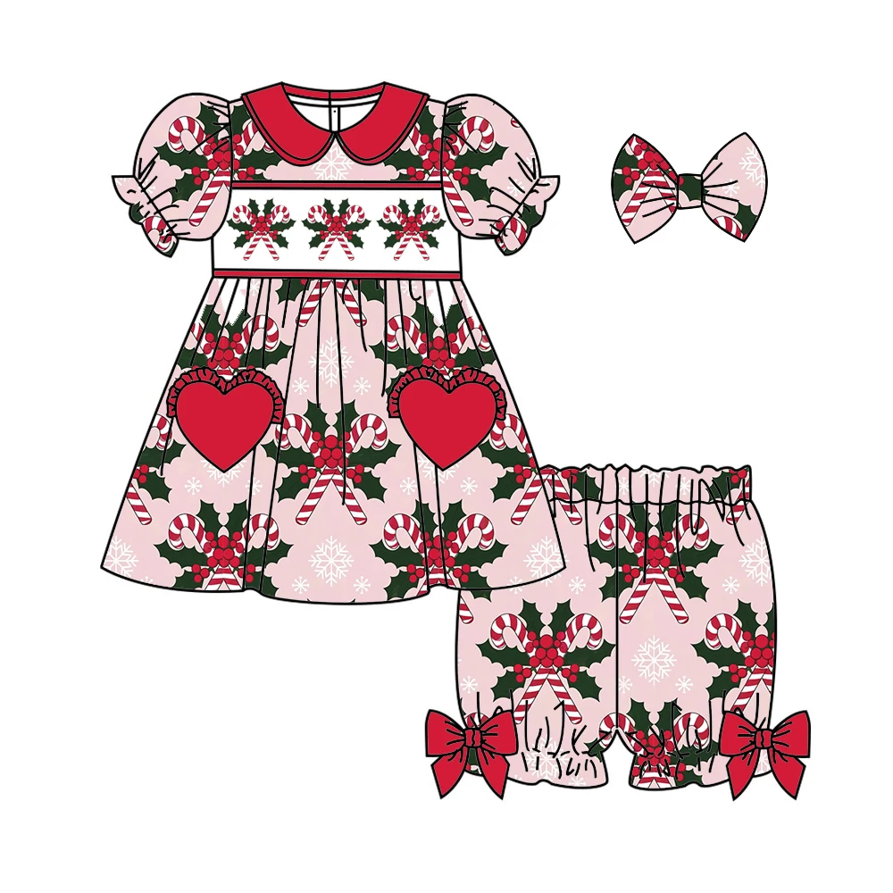 Christmas boutique kid's pjs set collared ruffled short-sleeved dress shorts bow-decorated buttons heart pocket cookie print
Christmas boutique kid's pjs set collared ruffled short-sleeved dress shorts bow-decorated buttons heart pocket cookie print