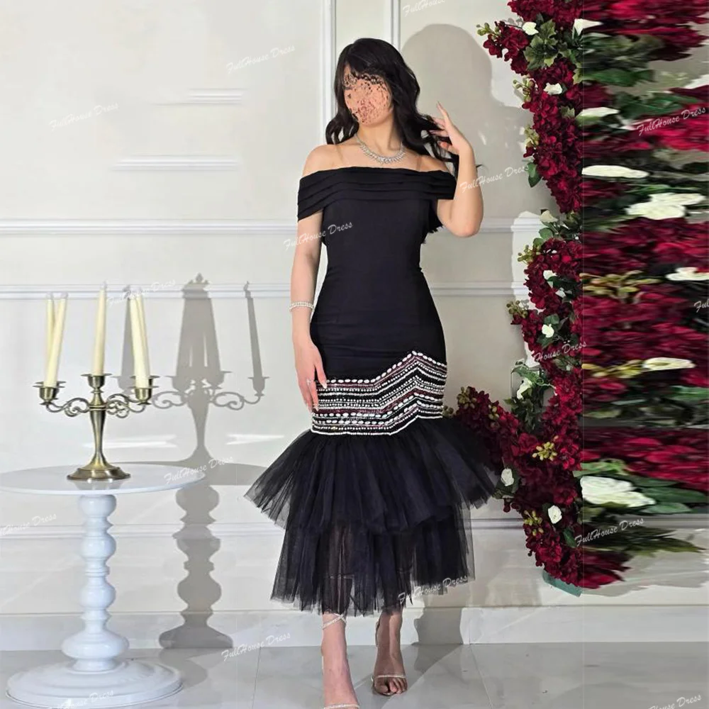 Custom Made Black Modest Boat Collar Saudi Dress Sleeveless Beading Sheath Backless Evening Dress Tea-Length فساتين سهر
Custom Made Black Modest Boat Collar Saudi Dress Sleeveless Beading Sheath Backless Evening Dress Tea-Length فساتين سهر