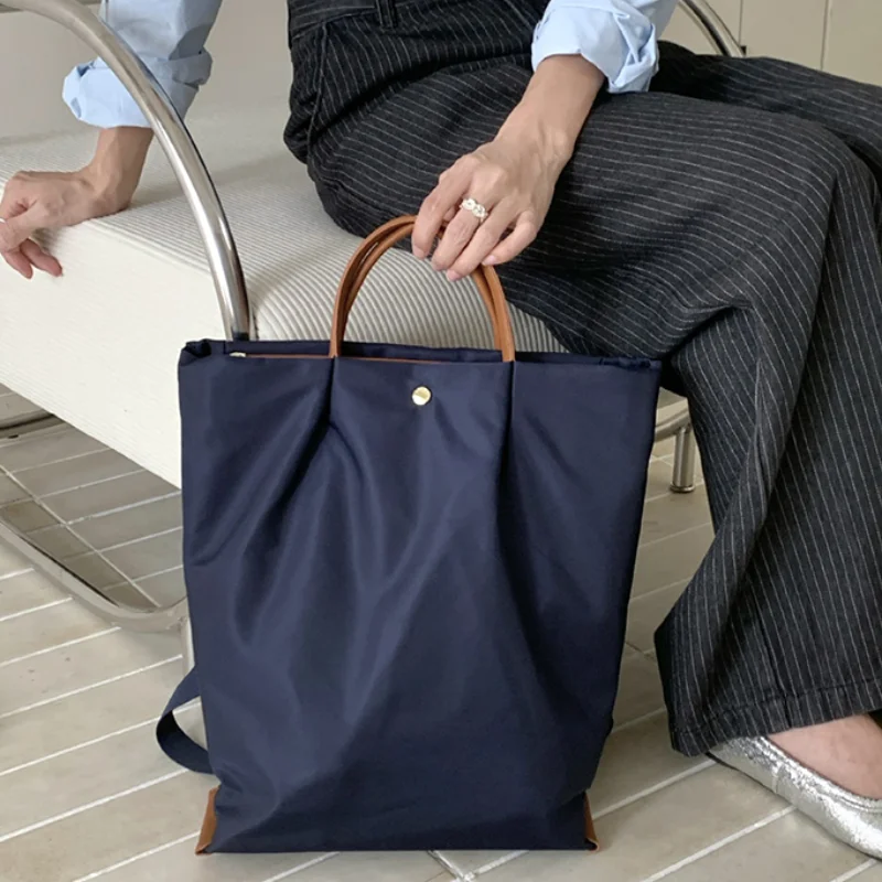 Japanese Minimalist Backpack Lightweight And Large-capacity Nylon Tote Bag Daily Casual Commuter Bag Waterproof Laptop Bag
Japanese Minimalist Backpack Lightweight And Large-capacity Nylon Tote Bag Daily Casual Commuter Bag Waterproof Laptop Bag