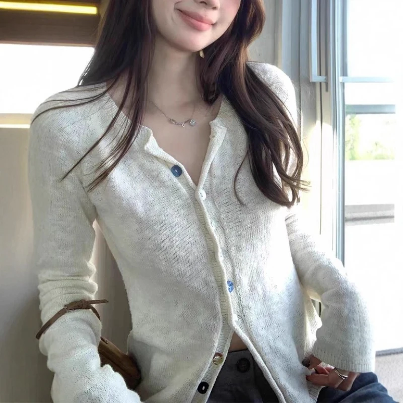 Color Blocking Shell Button Slimming Knitted Sweater for Women's Autumn Knitted Cardigan
Color Blocking Shell Button Slimming Knitted Sweater for Women's Autumn Knitted Cardigan