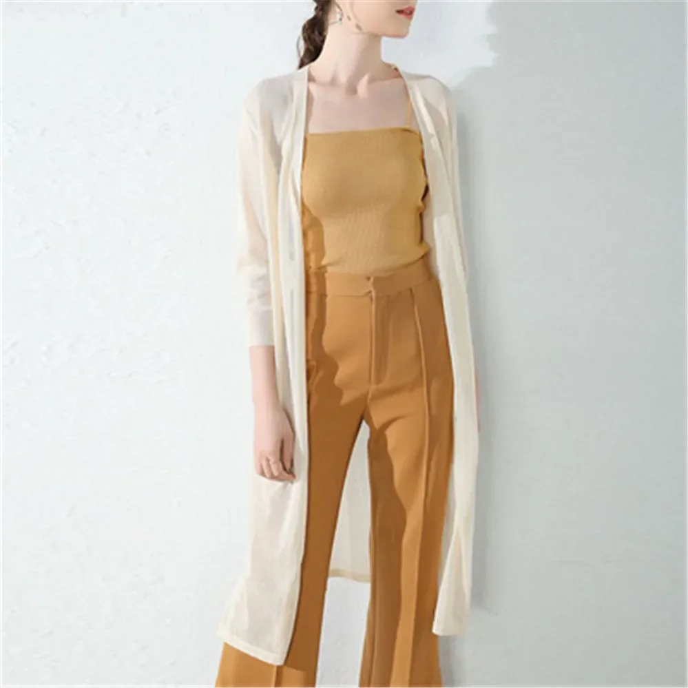 Summer Autumn Casual Silk Knitted Cardigans Female Loose Sweater Coat Plus Size 3XL 2025 Women Midi Long Thin Cardigan Jacket
Summer Autumn Casual Silk Knitted Cardigans Female Loose Sweater Coat Plus Size 3XL 2025 Women Midi Long Thin Cardigan Jacket