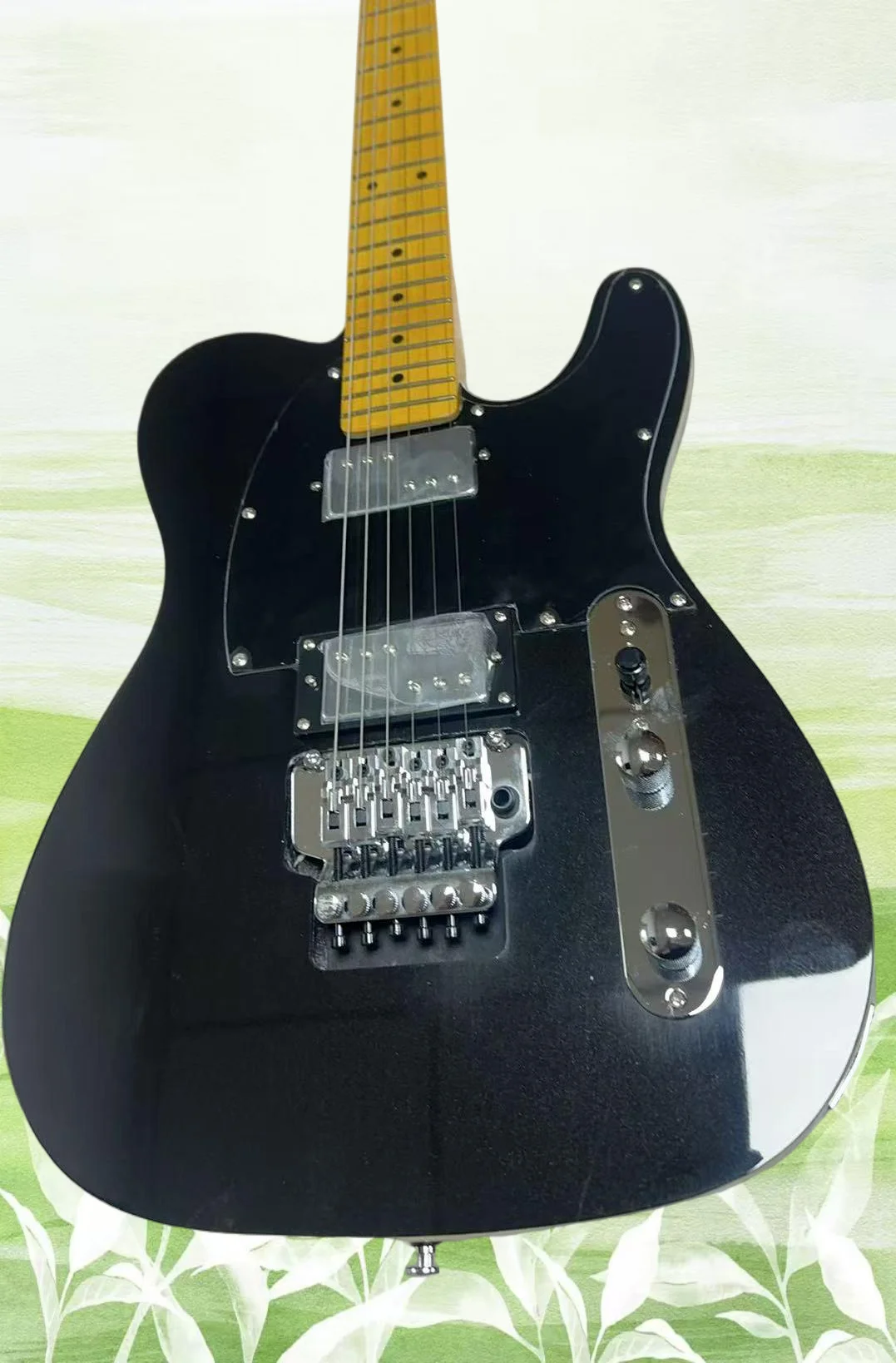 Ultra Luxe Floyd Rose HH Maple Mystic Black Guitar
Ultra Luxe Floyd Rose HH Maple Mystic Black Guitar