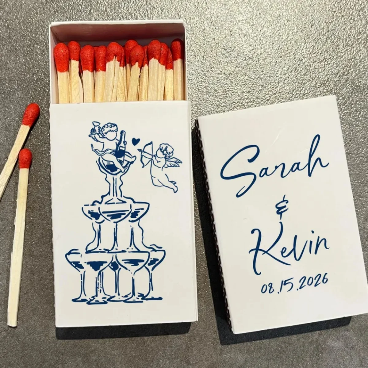 Custom Champagne Tower Wedding Matchbox Favors, Personalized Cupid Matchboxes with Couple Names, Elegant Guest Keepsake Party Ma
Custom Champagne Tower Wedding Matchbox Favors, Personalized Cupid Matchboxes with Couple Names, Elegant Guest Keepsake Party Ma