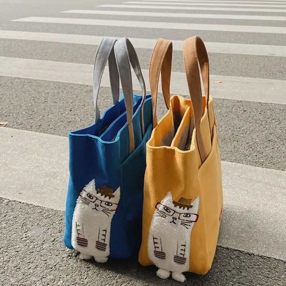 Cartoon Embroidery Cat Canvas Bag Large Capacity Portable Cloth Handbag Lunch Bag Printed Printing Cloth Tote Bag Shopping
Cartoon Embroidery Cat Canvas Bag Large Capacity Portable Cloth Handbag Lunch Bag Printed Printing Cloth Tote Bag Shopping