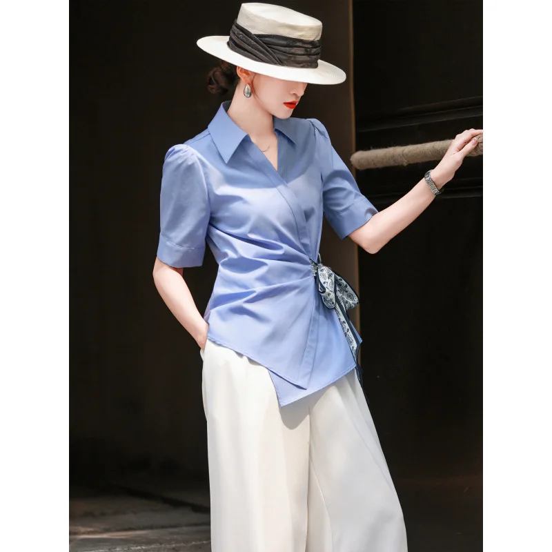 MEXCOCO 2026 Summer Commuter Elegant Turn Collar Puff Sleeve Wrap Twist Scarf Bow Irregular Hem Slim Women Blouse Top
MEXCOCO 2026 Summer Commuter Elegant Turn Collar Puff Sleeve Wrap Twist Scarf Bow Irregular Hem Slim Women Blouse Top
