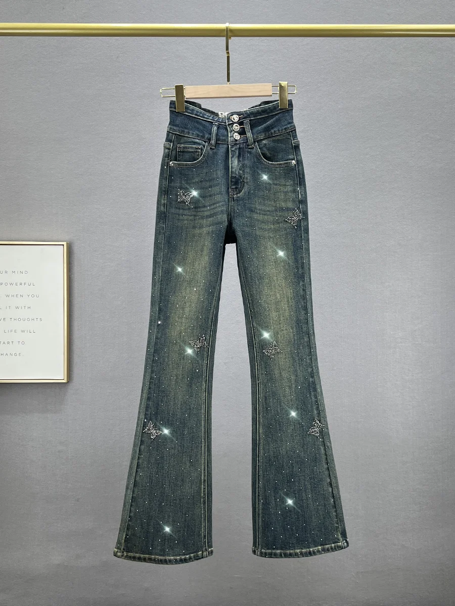 Женские джинсы-клеш из плотного денима с высокой талией, украшенные стразами, удлиненные, эластичные, из хлопкового стрейч-денима
Женские джинсы-клеш из плотного денима с высокой талией, украшенные стразами, удлиненные, эластичные, из хлопкового стрейч-денима