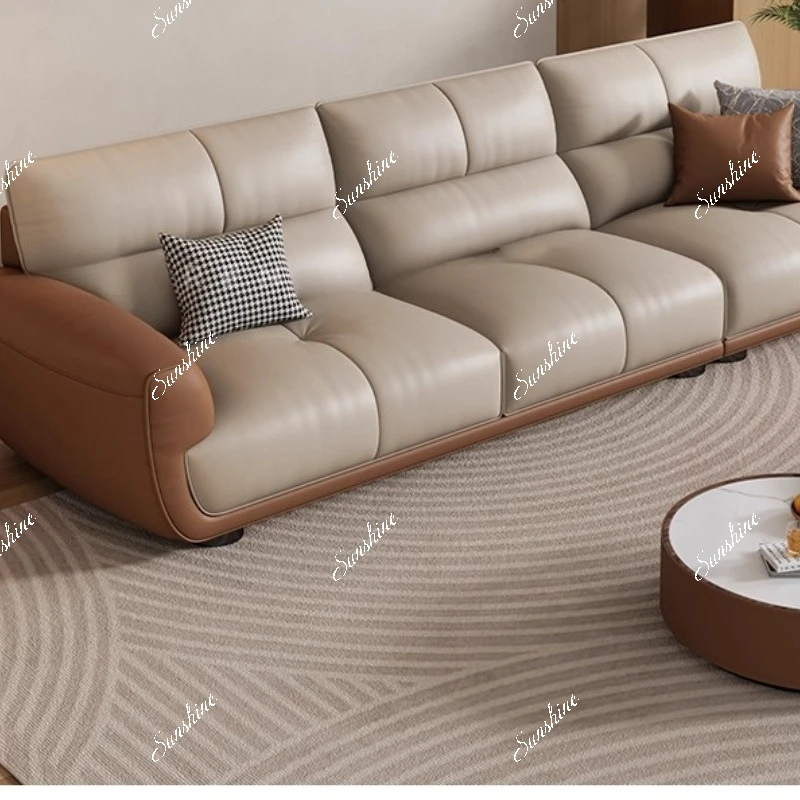 Italian light luxury leather sofa, living room simple modern size apartment straight row cream style
Italian light luxury leather sofa, living room simple modern size apartment straight row cream style