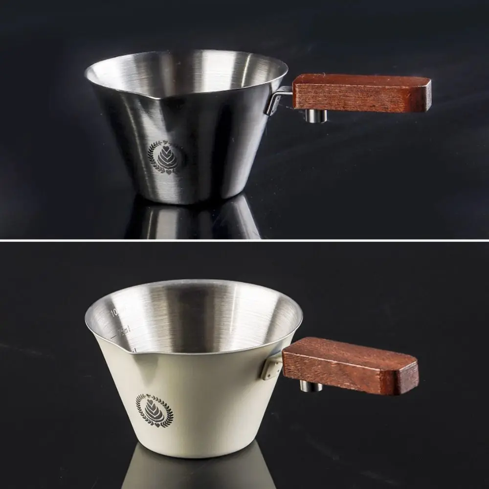 Кофейная чашка для эспрессо с деревянной ручкой, нержавеющая сталь 304, V-образный излив, мерная чашка для кофе со шкалой, прочная чашка для экстракта кофе
Кофейная чашка для эспрессо с деревянной ручкой, нержавеющая сталь 304, V-образный излив, мерная чашка для кофе со шкалой, прочная чашка для экстракта кофе