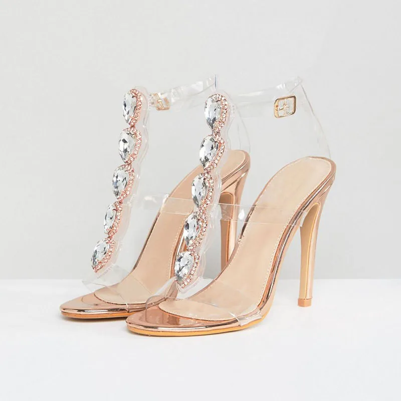 Arden Furtado Summer Roman style Transparent PVC Round toe Thin heel Belt buckle Super high heel Diamond chain Open toe sandals
Arden Furtado Summer Roman style Transparent PVC Round toe Thin heel Belt buckle Super high heel Diamond chain Open toe sandals