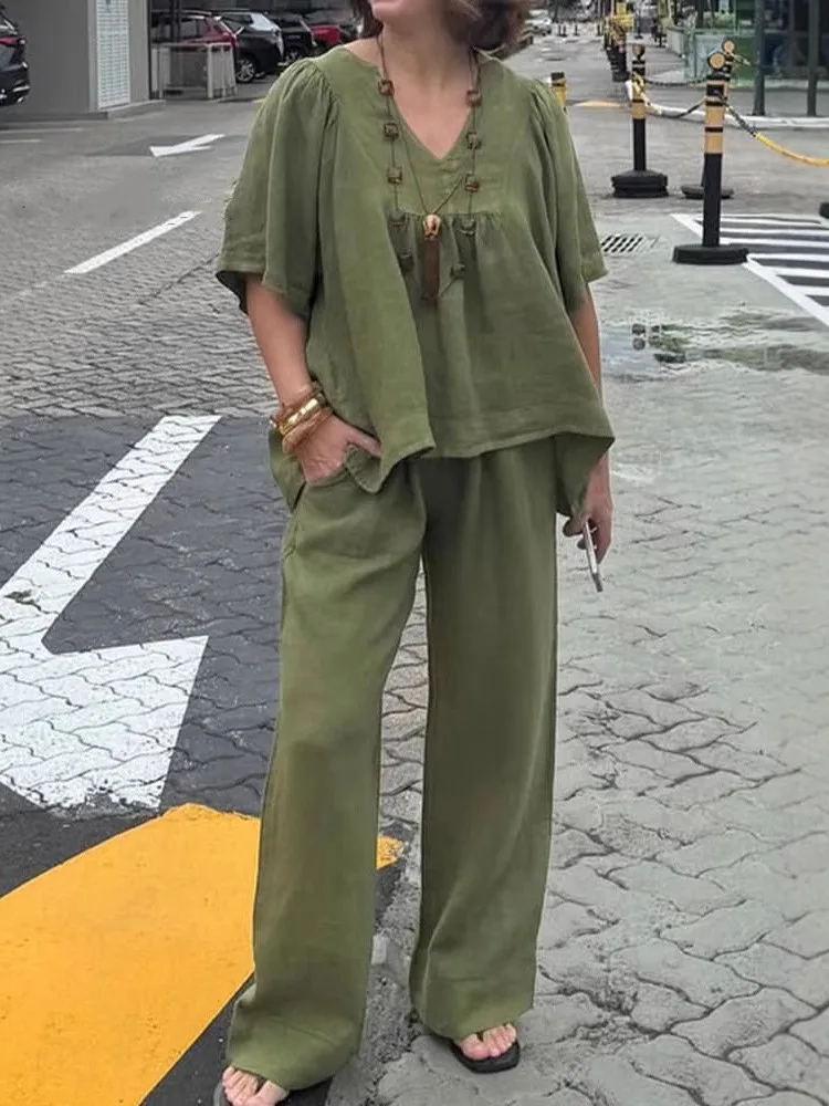 Casual Cotton Solid Two Piece Set For Women Half Sleeve V-neck Top And Packet Pants Fashion Loose Sets Office Lady Work Outfits
Casual Cotton Solid Two Piece Set For Women Half Sleeve V-neck Top And Packet Pants Fashion Loose Sets Office Lady Work Outfits
