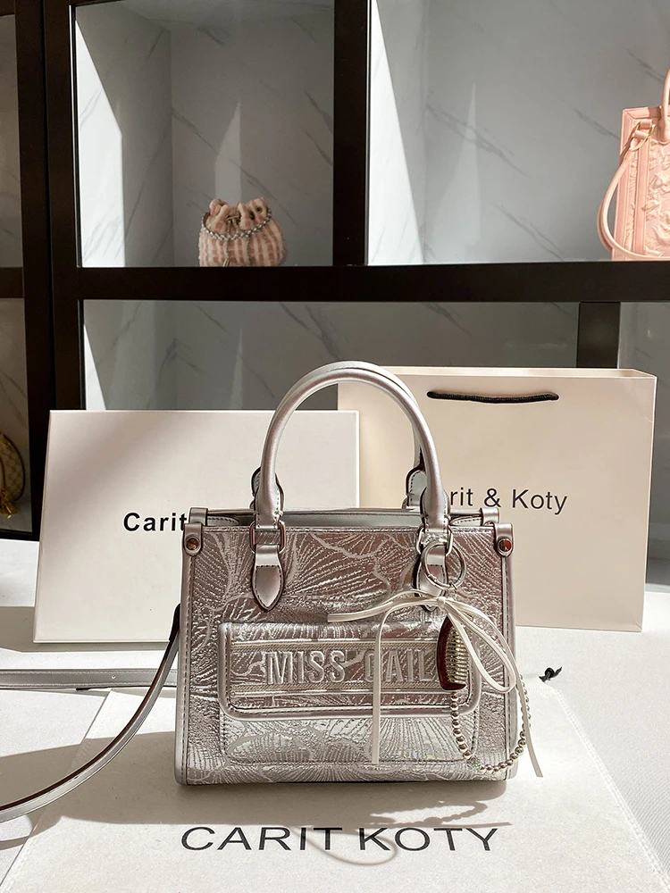 New Fashion and Retro Handheld Tote Bag with Silver Flower Embroidery Printing Women's Luxury and Top Shoulder Handbag for Party
New Fashion and Retro Handheld Tote Bag with Silver Flower Embroidery Printing Women's Luxury and Top Shoulder Handbag for Party