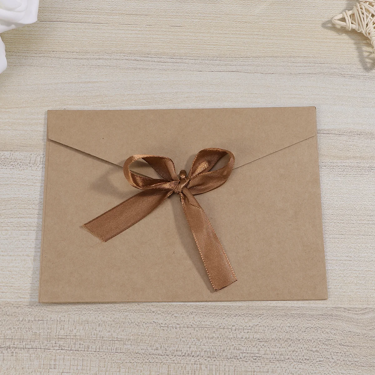 10 шт. ретро-конверты 17,5x12,5 см, крафт-бумага, креативный дизайн с бантом, сплошной цвет для свадебных приглашений, дня рождения, пустая фотография
10 шт. ретро-конверты 17,5x12,5 см, крафт-бумага, креативный дизайн с бантом, сплошной цвет для свадебных приглашений, дня рождения, пустая фотография