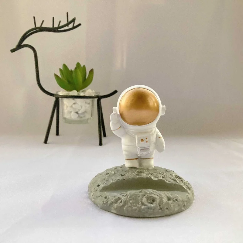 Creative astronaut moon astronaut station planet small ornaments children's room National Day resin ornaments
Creative astronaut moon astronaut station planet small ornaments children's room National Day resin ornaments