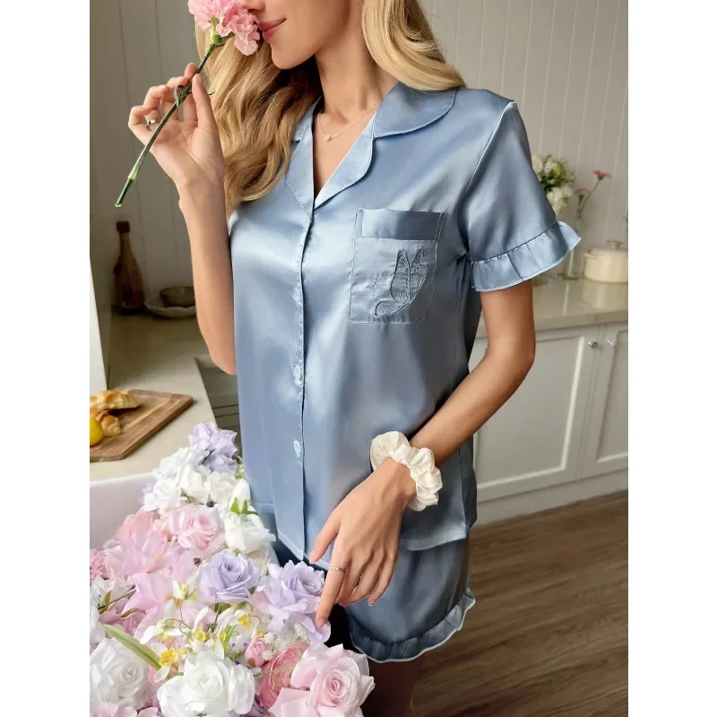 Snug Reverie Elegant Embroidered Ruffle Silky Satin Lapel Short Sleeve Shorts Pajama Set For Women
Snug Reverie Elegant Embroidered Ruffle Silky Satin Lapel Short Sleeve Shorts Pajama Set For Women