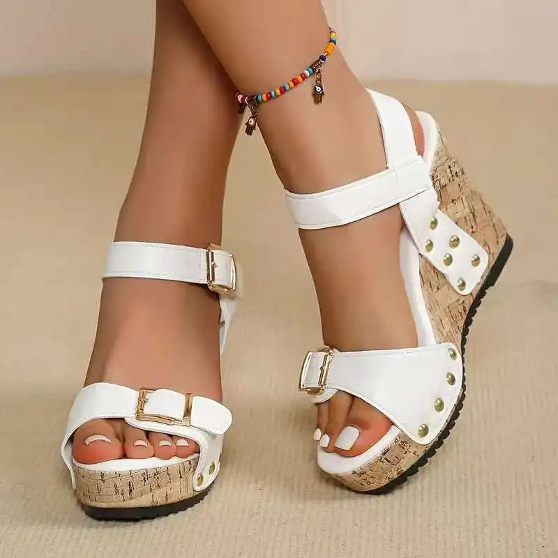 Spring/Summer 2025 new style button-strap riveted sandals, fishmouth wedge heel waterproof trolley stitching sandals for women
Spring/Summer 2025 new style button-strap riveted sandals, fishmouth wedge heel waterproof trolley stitching sandals for women