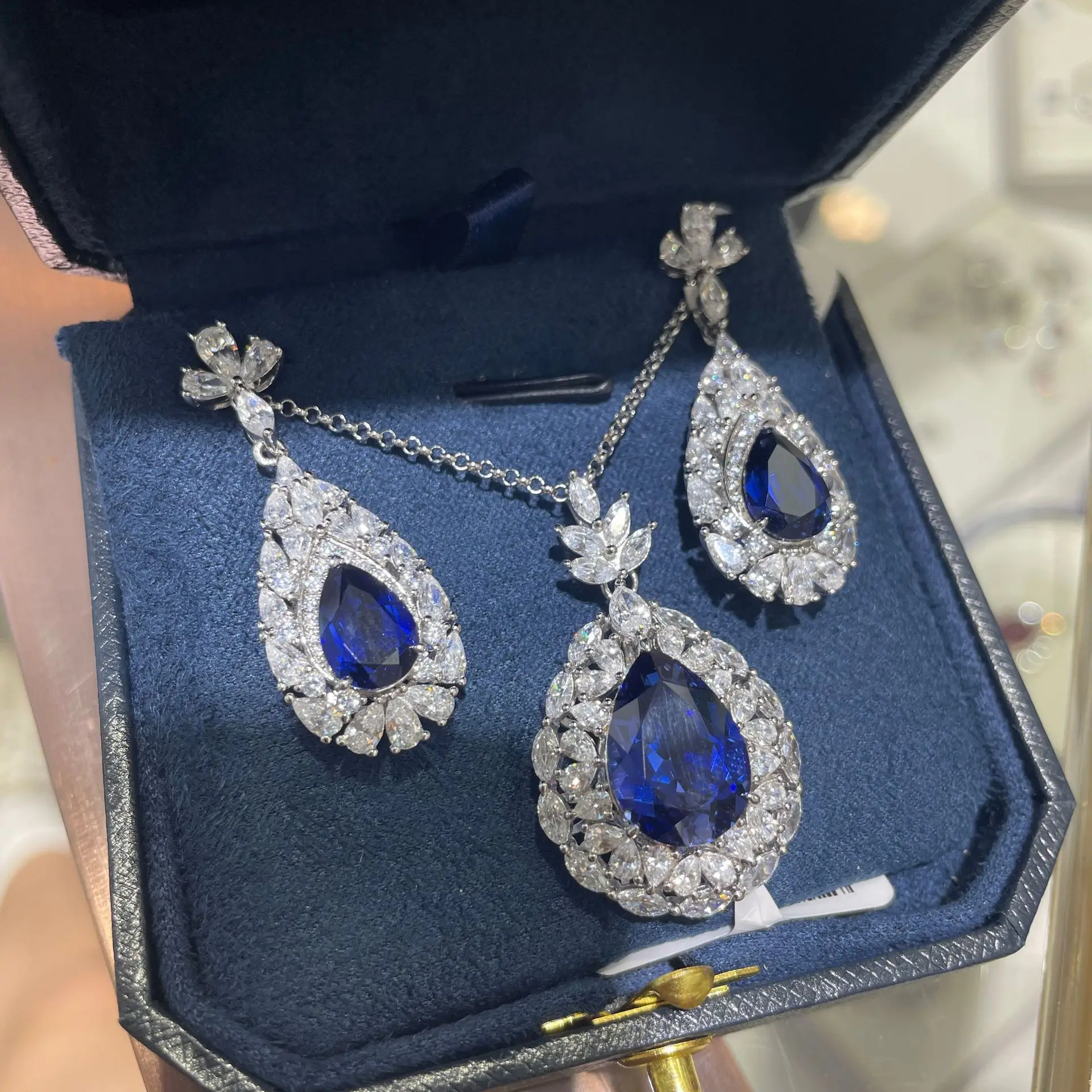 925 Silver Gold Plated Lab Grown Sapphire Necklace Earrings Set, 6CT Full Pave Teardrop Design, Diamond Alternative Jewelry
925 Silver Gold Plated Lab Grown Sapphire Necklace Earrings Set, 6CT Full Pave Teardrop Design, Diamond Alternative Jewelry