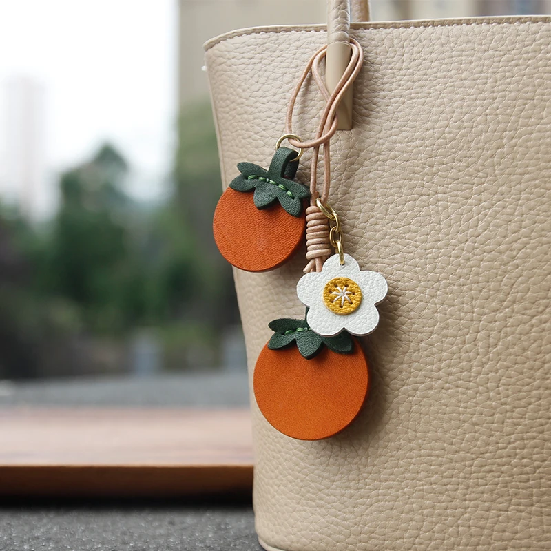 Original handmade leather persimmon bag pendant hanging ornament cute accessory ornament keychain exquisite decoration gift
Original handmade leather persimmon bag pendant hanging ornament cute accessory ornament keychain exquisite decoration gift