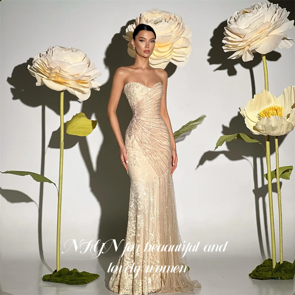 NFYN Champagne Party Dress Strapless Sleeveless Evening Dress Glitter Sequin Wrap Hips Prom Gown Tassel فساتين سهره Customized
NFYN Champagne Party Dress Strapless Sleeveless Evening Dress Glitter Sequin Wrap Hips Prom Gown Tassel فساتين سهره Customized