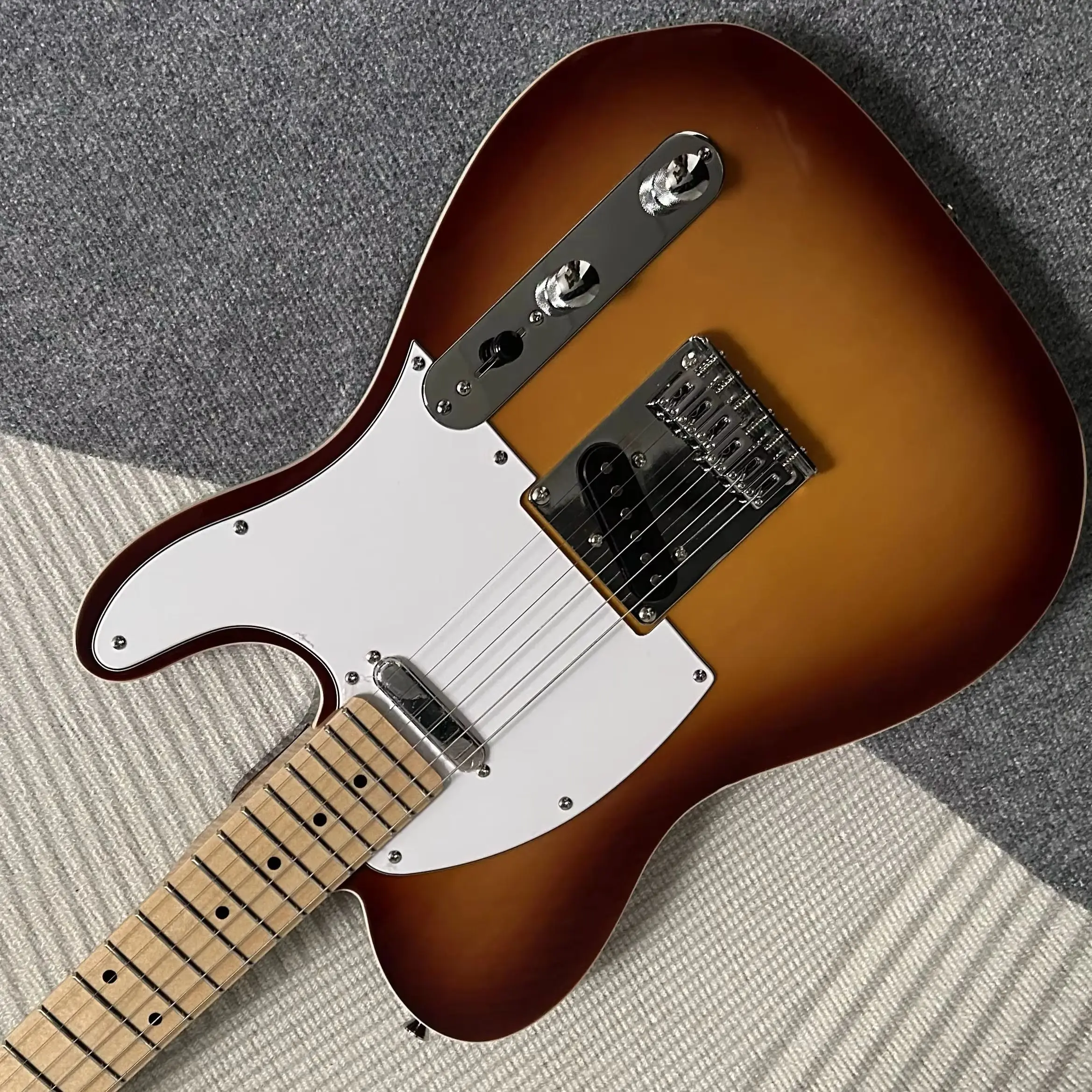 Hot Sale Electric Guitars Mahogany Body Vintage Sunburst Color Single Binding Maple Fretboard
Hot Sale Electric Guitars Mahogany Body Vintage Sunburst Color Single Binding Maple Fretboard
