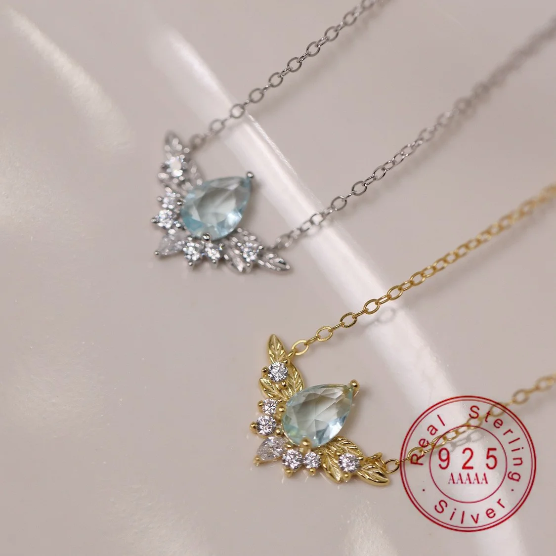 925 Sterling Silver 14K Gold Plated Blue Water Drop Zircon Wing Pendant Necklace for Women Fine Jewelry Gift
925 Sterling Silver 14K Gold Plated Blue Water Drop Zircon Wing Pendant Necklace for Women Fine Jewelry Gift