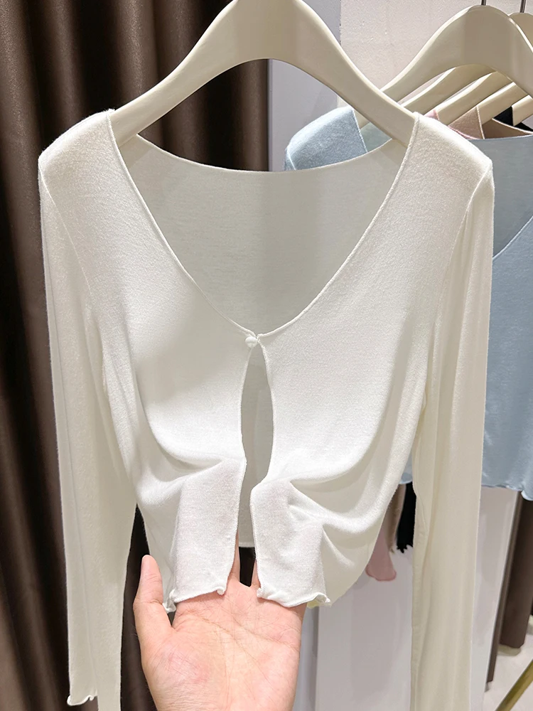 Белый тонкий летний кардиган из ледяного шелка, вязаный, с защитой от солнца, легкая накидка для пляжа/отдыха
Белый тонкий летний кардиган из ледяного шелка, вязаный, с защитой от солнца, легкая накидка для пляжа/отдыха