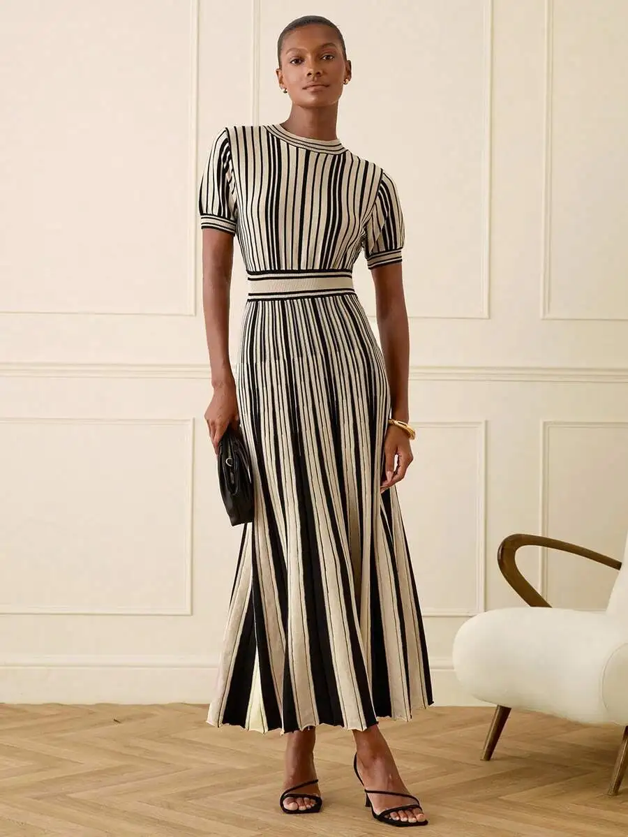 Ivory And Black Vertical Striped Knit Maxi Dress For Women, High Mock Neck, Short Puffed Sleeves, Fitted Waist With Front Slit
Ivory And Black Vertical Striped Knit Maxi Dress For Women, High Mock Neck, Short Puffed Sleeves, Fitted Waist With Front Slit