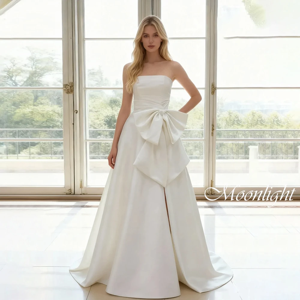 Elegant Strapless Bow A-Line Wedding Dress 2026 Women High Side Slit Sleeveless Open Back Buttons Vestidos De Novia Customized
Elegant Strapless Bow A-Line Wedding Dress 2026 Women High Side Slit Sleeveless Open Back Buttons Vestidos De Novia Customized