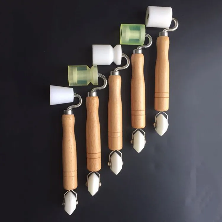 Wooden Handle Wallpaper Seam Roller Double Head Bearing Tool for Professional Wallpaper Installation
Wooden Handle Wallpaper Seam Roller Double Head Bearing Tool for Professional Wallpaper Installation