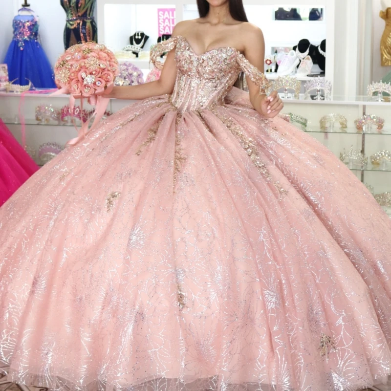 Pink Shiny Quinceanera Dresses Ball Gown Off The Shoulder Sequin Applique Lace Beading Crystal Bow Tull Corset Sweet 16 Dress
Pink Shiny Quinceanera Dresses Ball Gown Off The Shoulder Sequin Applique Lace Beading Crystal Bow Tull Corset Sweet 16 Dress