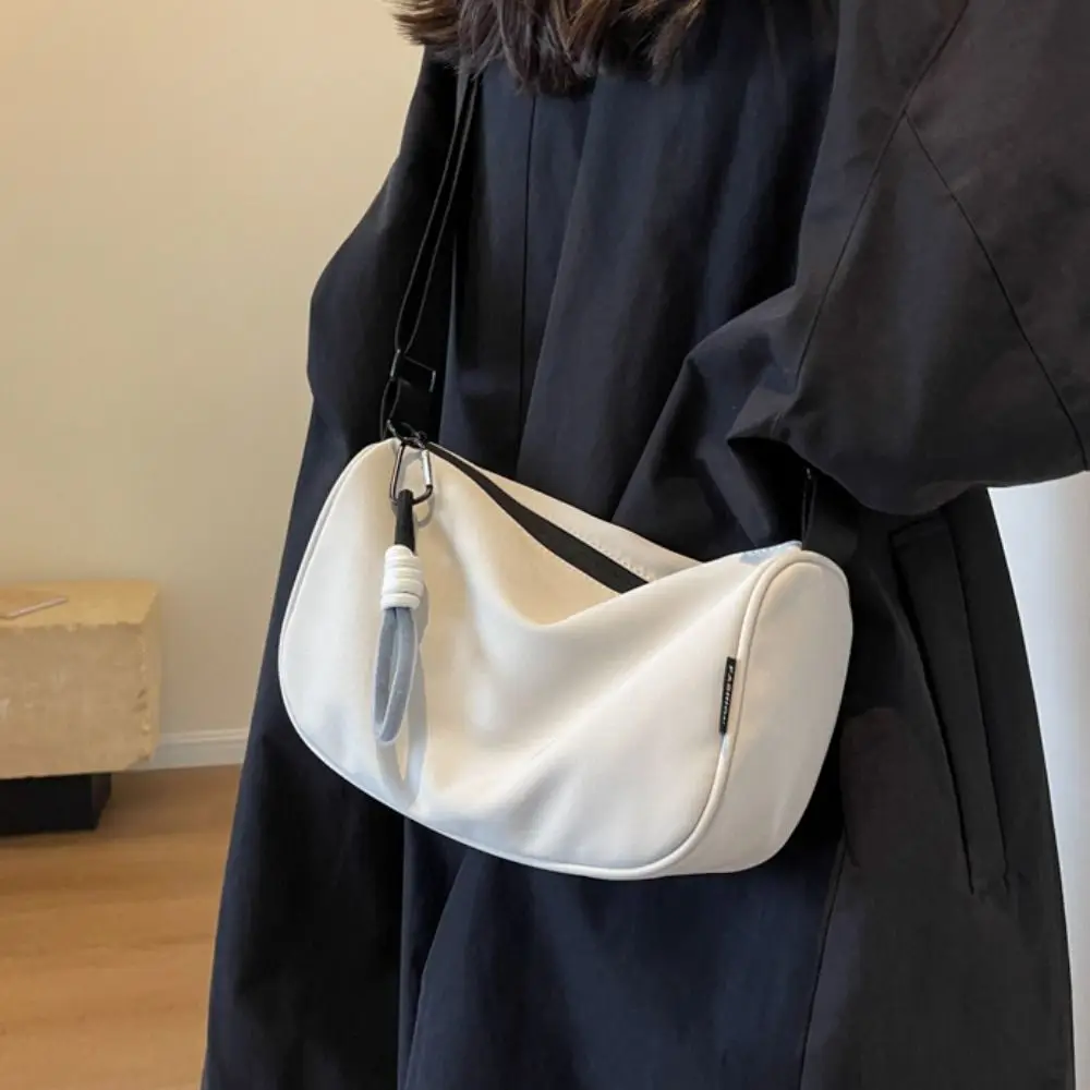 Korean Style Solid Color Hand Bag with Short Lanyard Pendant Dumplings Bag Light Soft Nylon Bag Tote Bag Large Capacity
Korean Style Solid Color Hand Bag with Short Lanyard Pendant Dumplings Bag Light Soft Nylon Bag Tote Bag Large Capacity