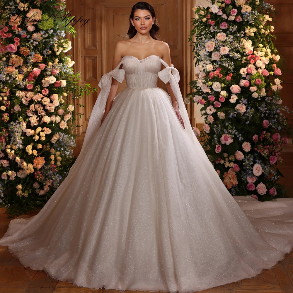 Lceland Poppy Customized Ball Gown Off the Shoulder Wedding Dresses Glitter Tulle Floor Length Pleated Bridal Gowns
Lceland Poppy Customized Ball Gown Off the Shoulder Wedding Dresses Glitter Tulle Floor Length Pleated Bridal Gowns