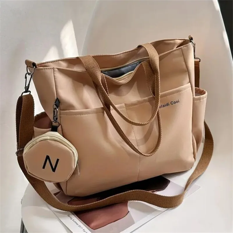 Женские сумки-тоут, простая холщовая сумка большой вместимости, легкая сумка через плечо для путешествий с мини-кошельком на молнии
Женские сумки-тоут, простая холщовая сумка большой вместимости, легкая сумка через плечо для путешествий с мини-кошельком на молнии