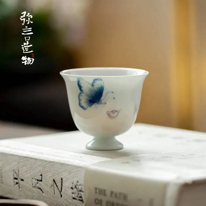 Hand-painted Butterfly High-footed Tea Cup White Porcelain Tea Cup Чайная чашка
Hand-painted Butterfly High-footed Tea Cup White Porcelain Tea Cup Чайная чашка