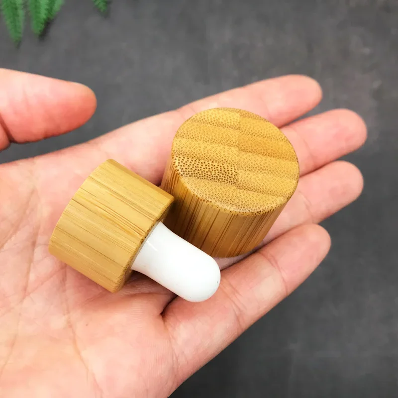 wooden cap for essential oil glassbottleglassdropper bottle with bamboo cap glass essential oil bottle cosmetic packaging bottle
wooden cap for essential oil glassbottleglassdropper bottle with bamboo cap glass essential oil bottle cosmetic packaging bottle