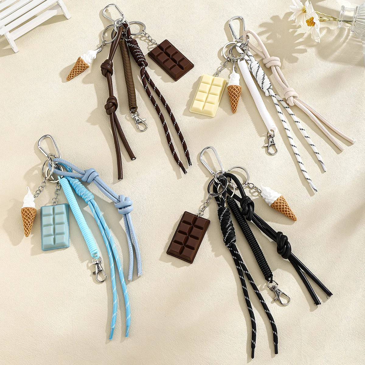 New Fashion Miu Keychain High-end Niche Woven Rope Creative Chocolate Ice Cream Pendant Fashion Bag Parts Accessories
New Fashion Miu Keychain High-end Niche Woven Rope Creative Chocolate Ice Cream Pendant Fashion Bag Parts Accessories