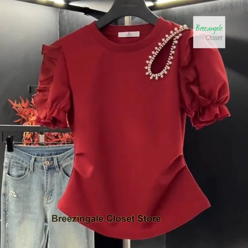 French red retro bubble sleeve blouse female summer elegant hollow fashion design sense beaded temperament short sleeve T-shirt.
French red retro bubble sleeve blouse female summer elegant hollow fashion design sense beaded temperament short sleeve T-shirt.